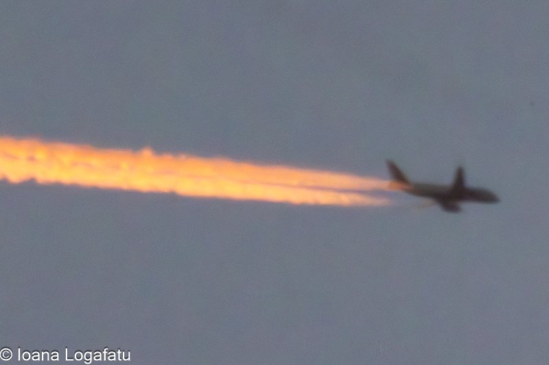 Jet stream blazing through twilight skies